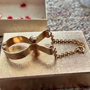 Vintage gold toned glove clip